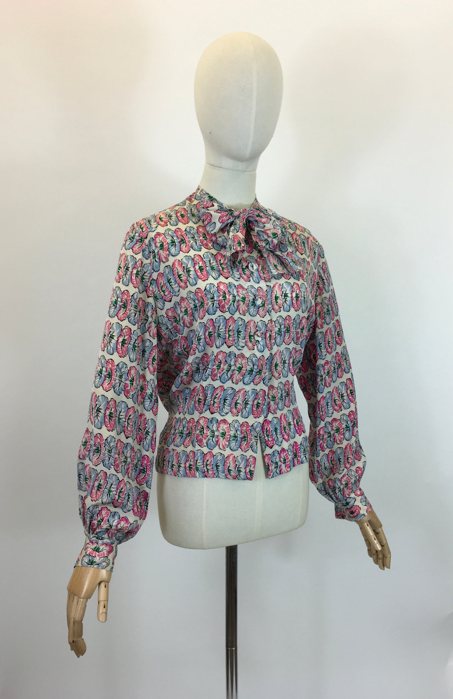 Original fabulous 1940’s long sleeved blouse - in Pink and Blue flower heads.
