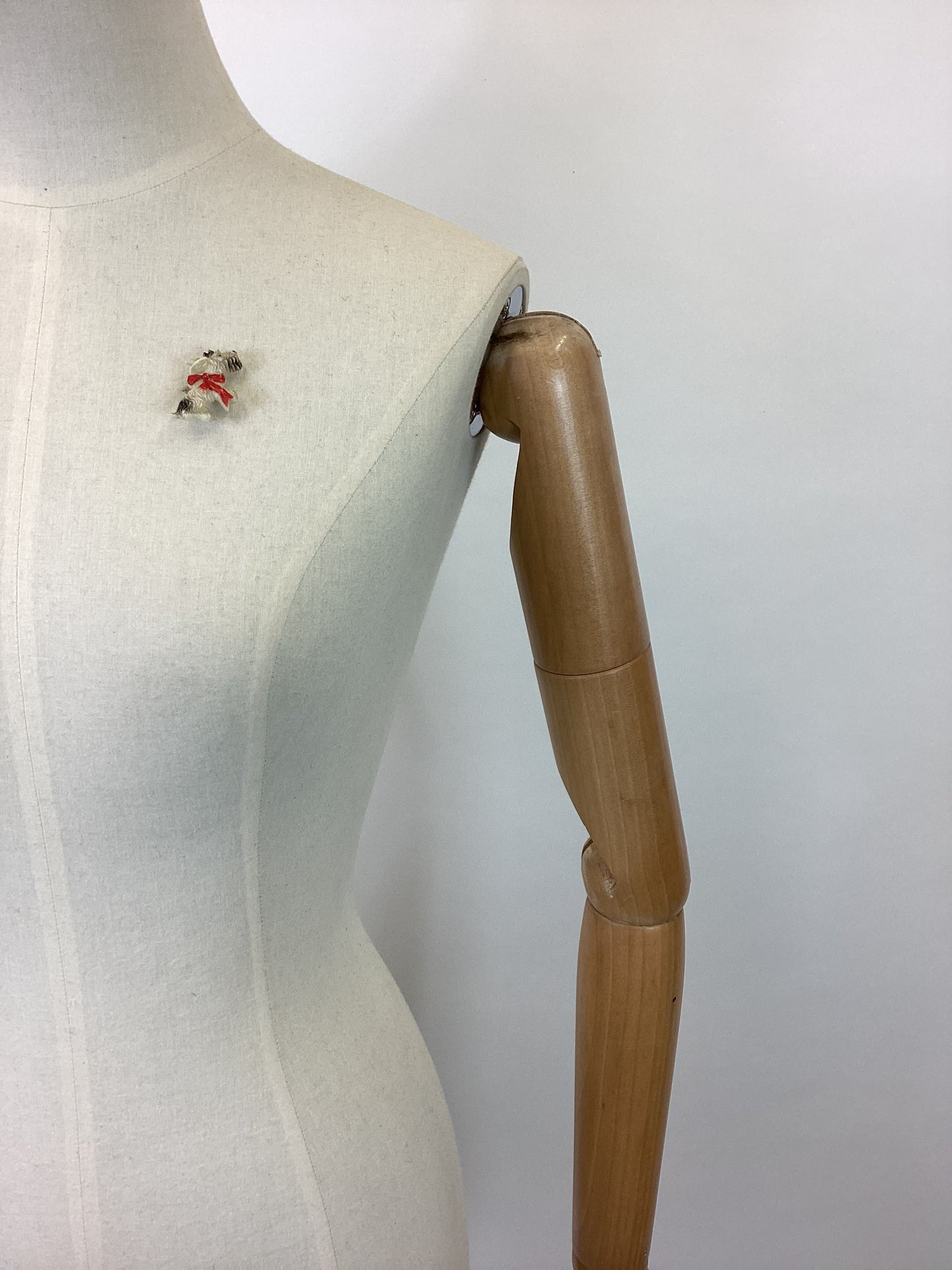 Original 40’s celluloid Brooch- sitting dog.