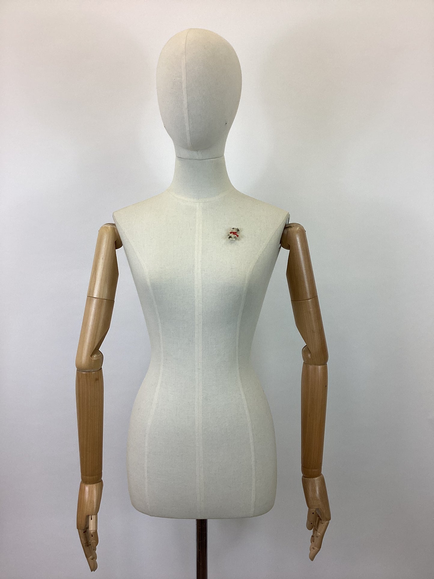 Original 40’s celluloid Brooch- sitting dog.