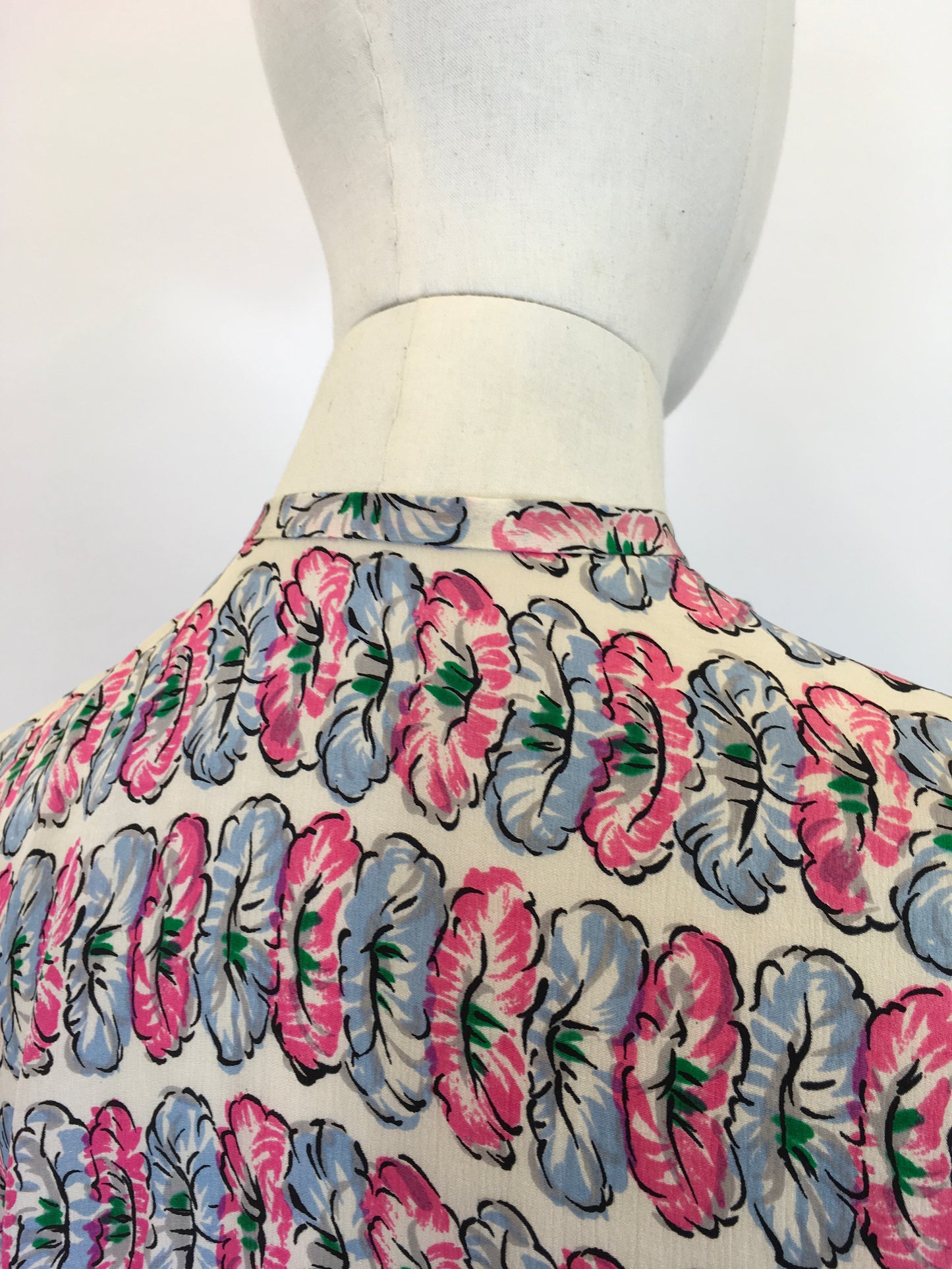 Original fabulous 1940’s long sleeved blouse - in Pink and Blue flower heads.