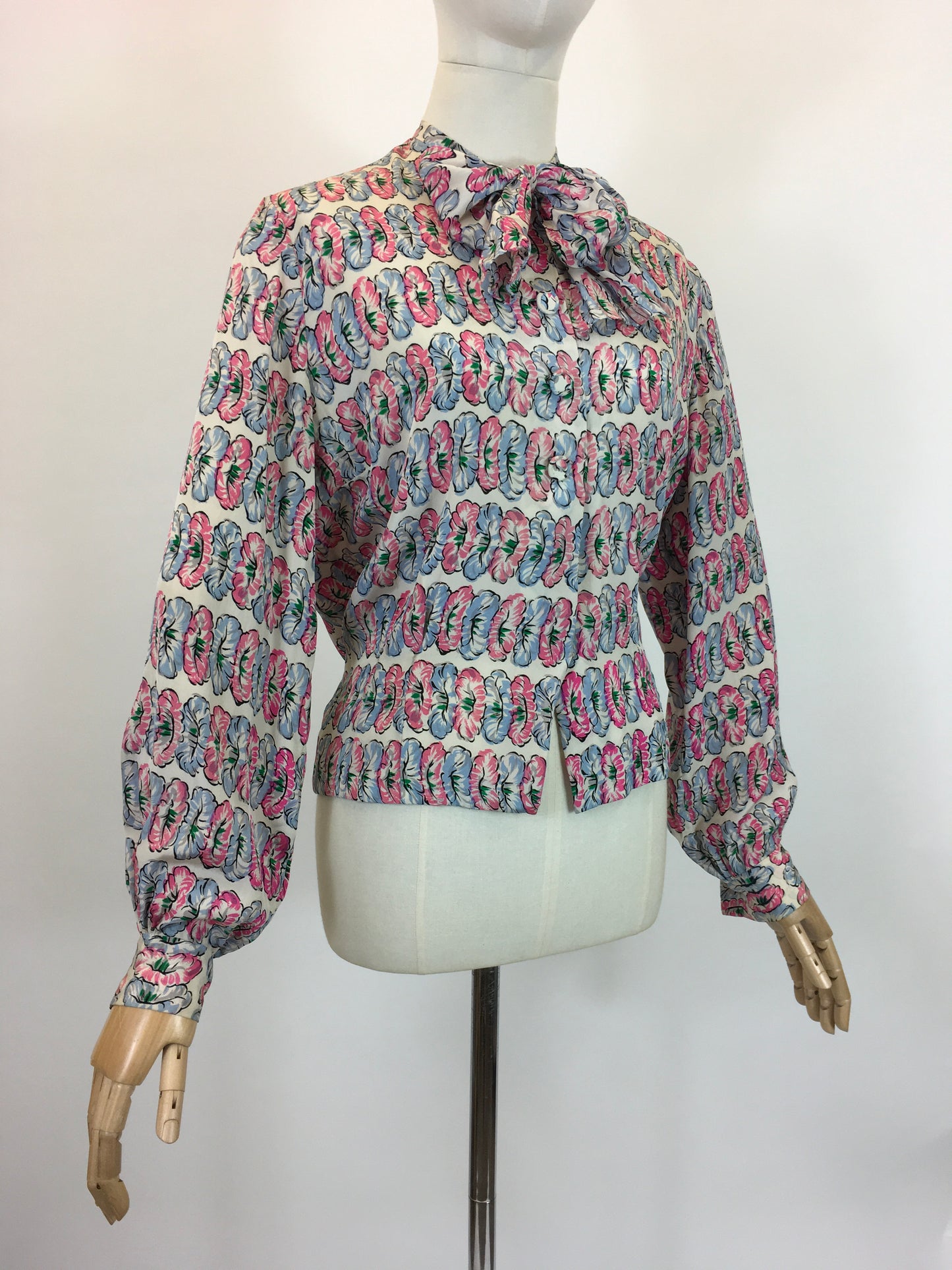 Original fabulous 1940’s long sleeved blouse - in Pink and Blue flower heads.