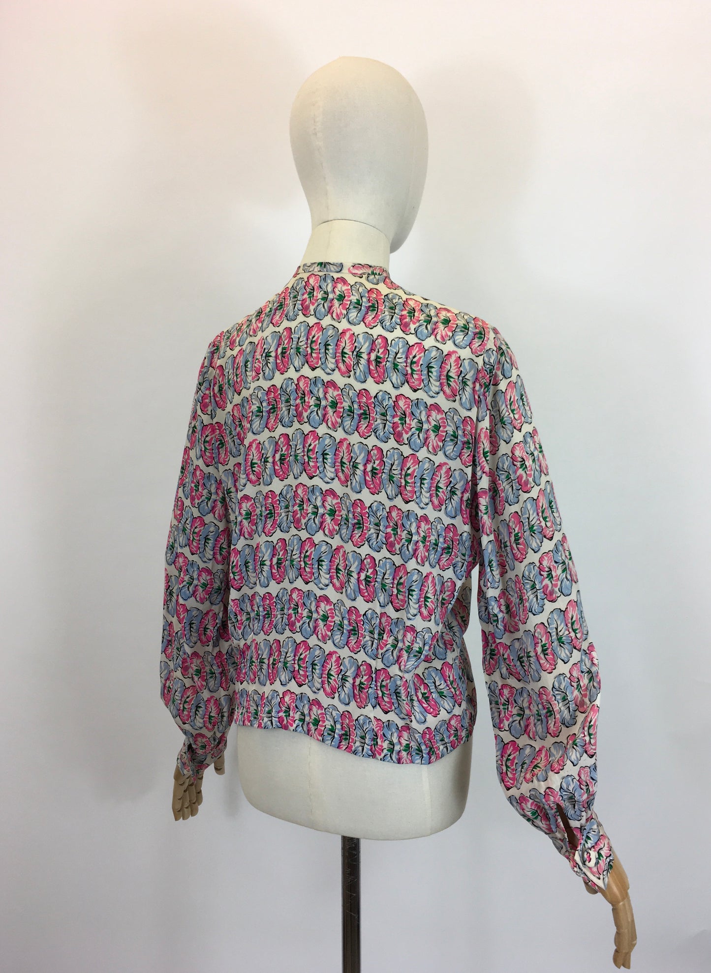 Original fabulous 1940’s long sleeved blouse - in Pink and Blue flower heads.