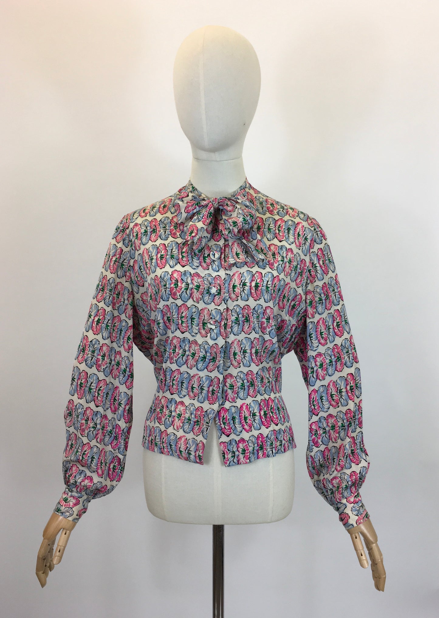 Original fabulous 1940’s long sleeved blouse - in Pink and Blue flower heads.
