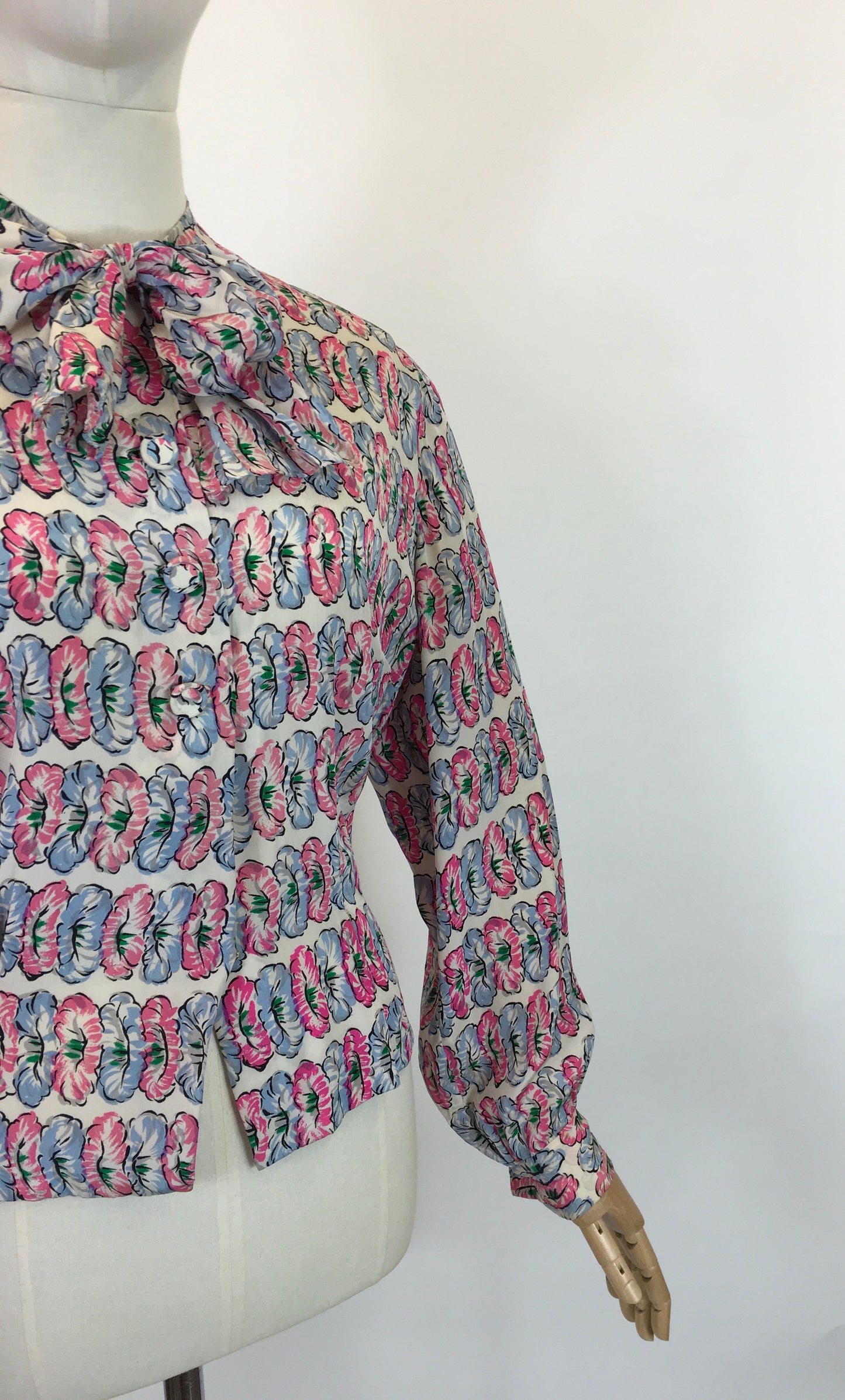 Original fabulous 1940’s long sleeved blouse - in Pink and Blue flower heads.