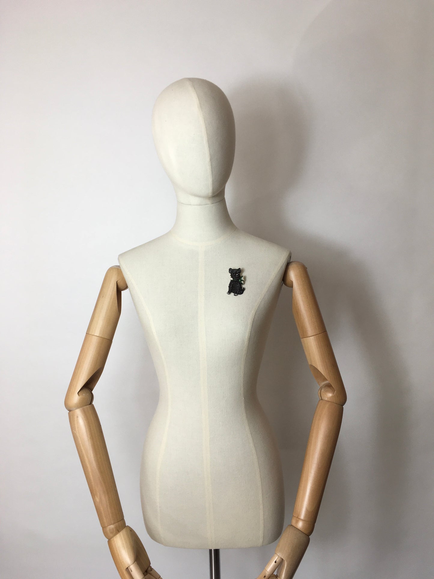 Original 1940’s Celluloid Dog Brooch - Dark Black with a Lovely Green Bow