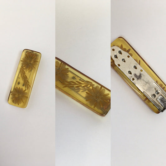 Original 1940s Carved Bakelite Dress Clip - In A Light Amber Colour way With Etched Florals