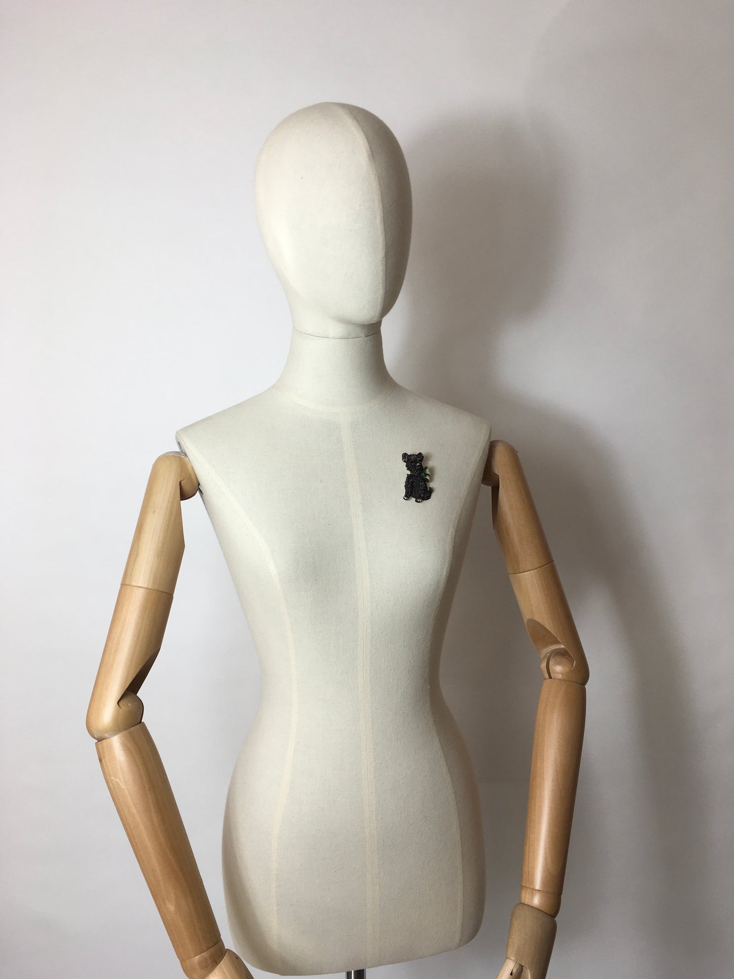 Original 1940’s Celluloid Dog Brooch - Dark Black with a Lovely Green Bow