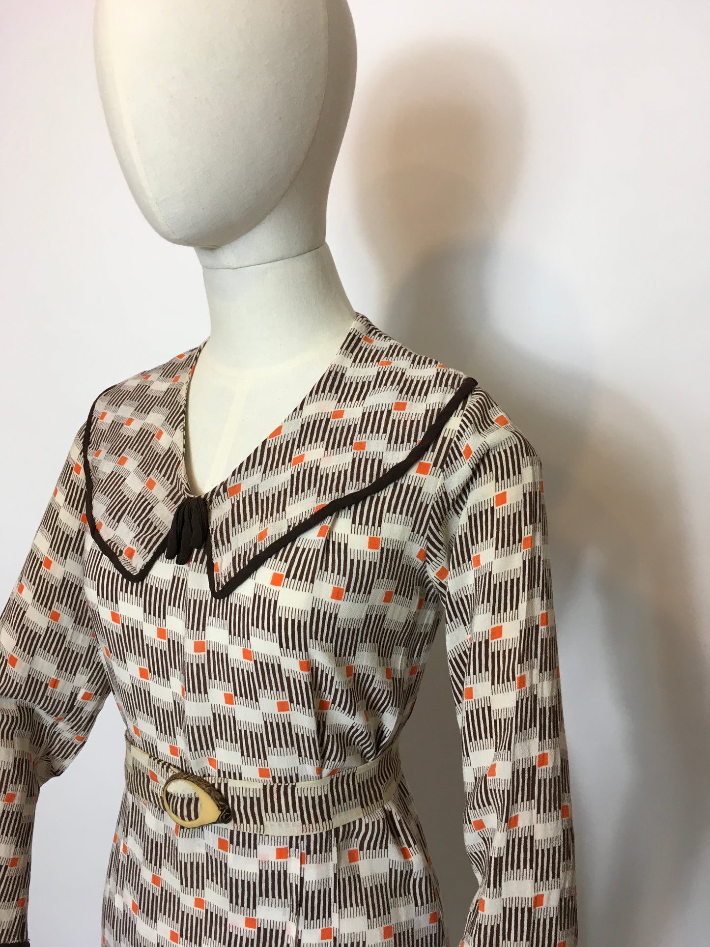 Original 1930’s Day Dress in an Amazing Geometric / Cigarette Print Dress in Browns, old Creams and deco Oranges - Festival Of Vintage Fashion Show Exclusive