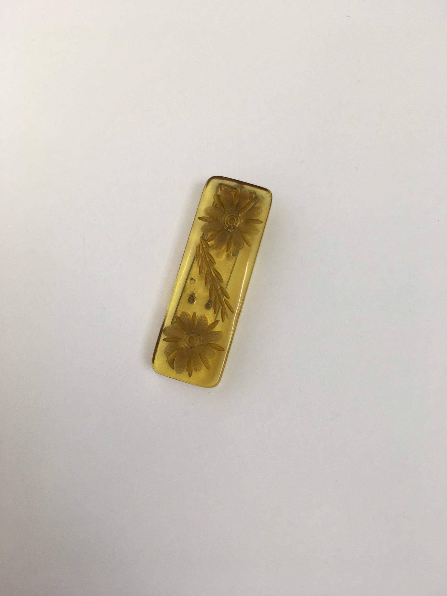 Original 1940s Carved Bakelite Dress Clip - In A Light Amber Colour way With Etched Florals
