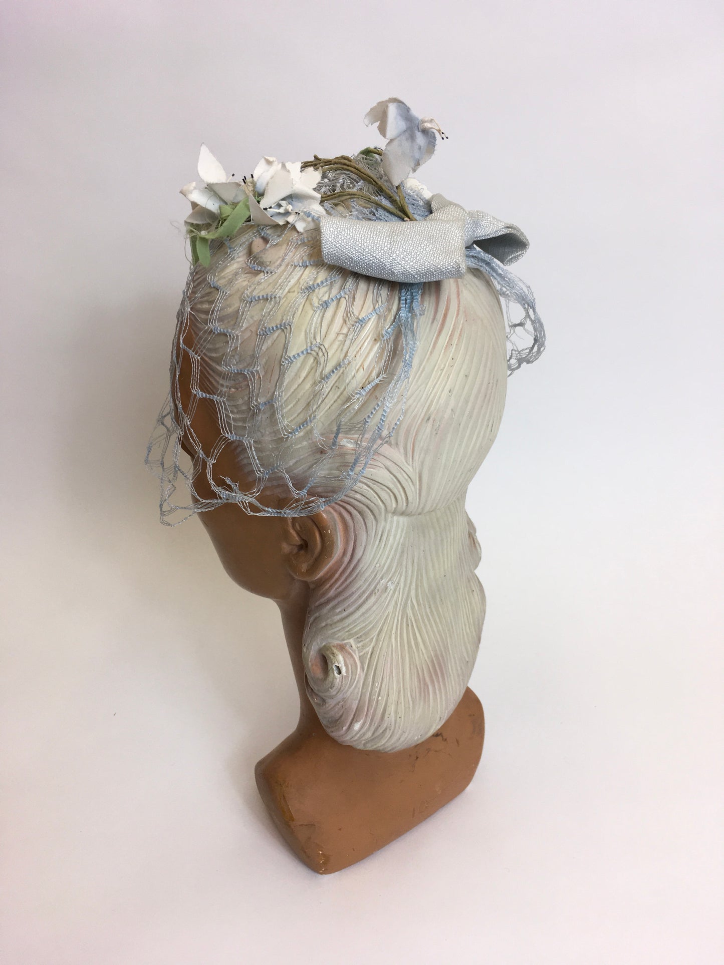 Original late 1940’s early 1950s Headpiece - Powder blue veiling adorned with ivory & green flowers
