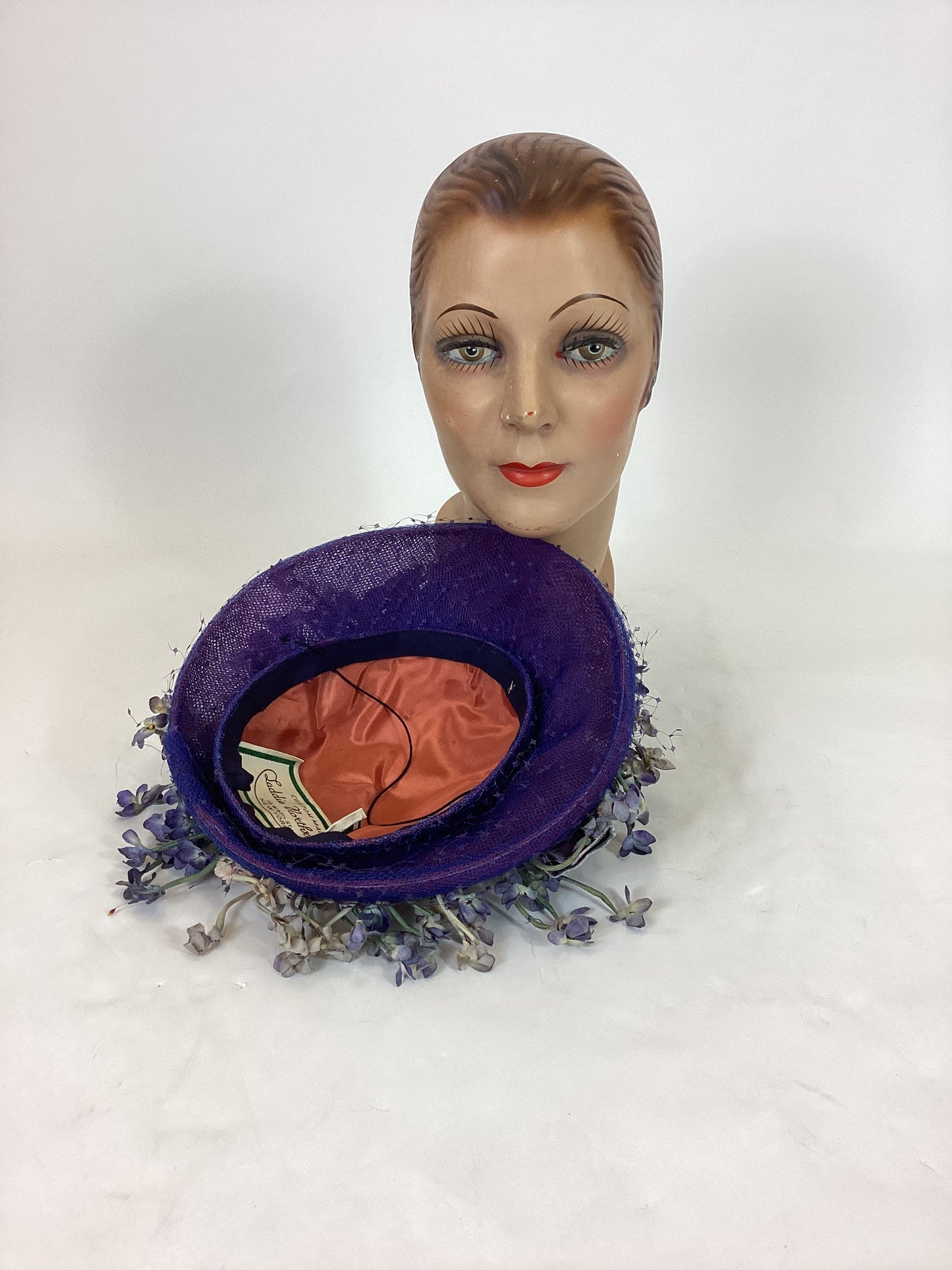 Original 1940’s Striking Platter Hat - A true Cadbury Purple, adorned with mixed flowers.