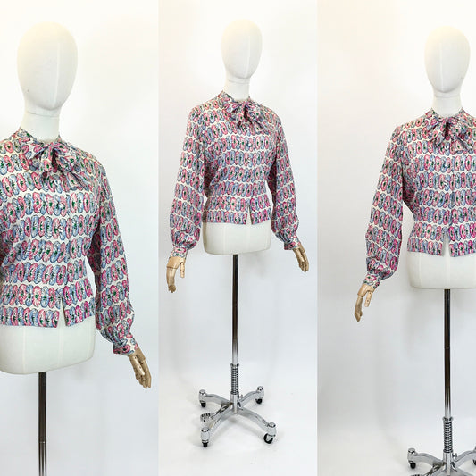 Original fabulous 1940’s long sleeved blouse - in Pink and Blue flower heads.