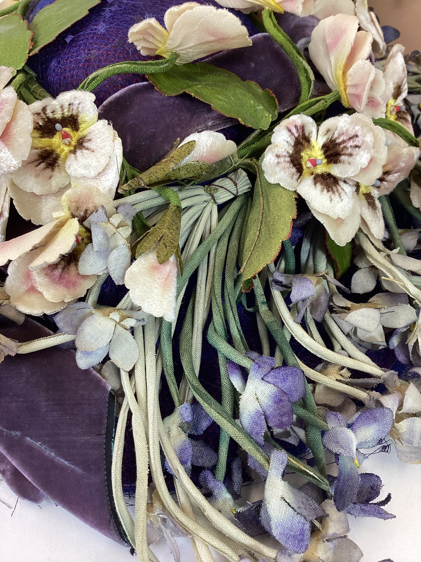 Original 1940’s Striking Platter Hat - A true Cadbury Purple, adorned with mixed flowers.