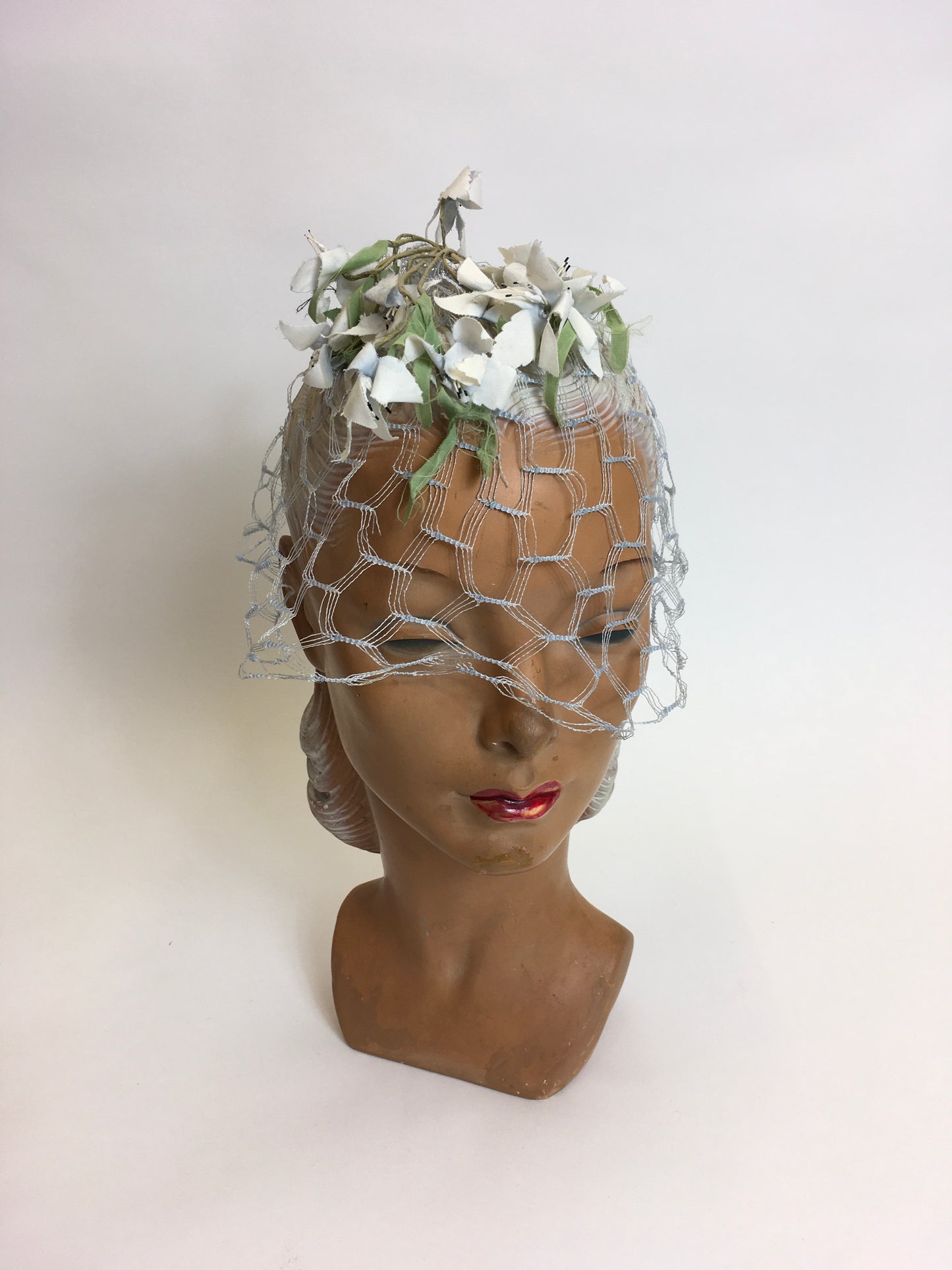 Original late 1940’s early 1950s Headpiece - Powder blue veiling adorned with ivory & green flowers