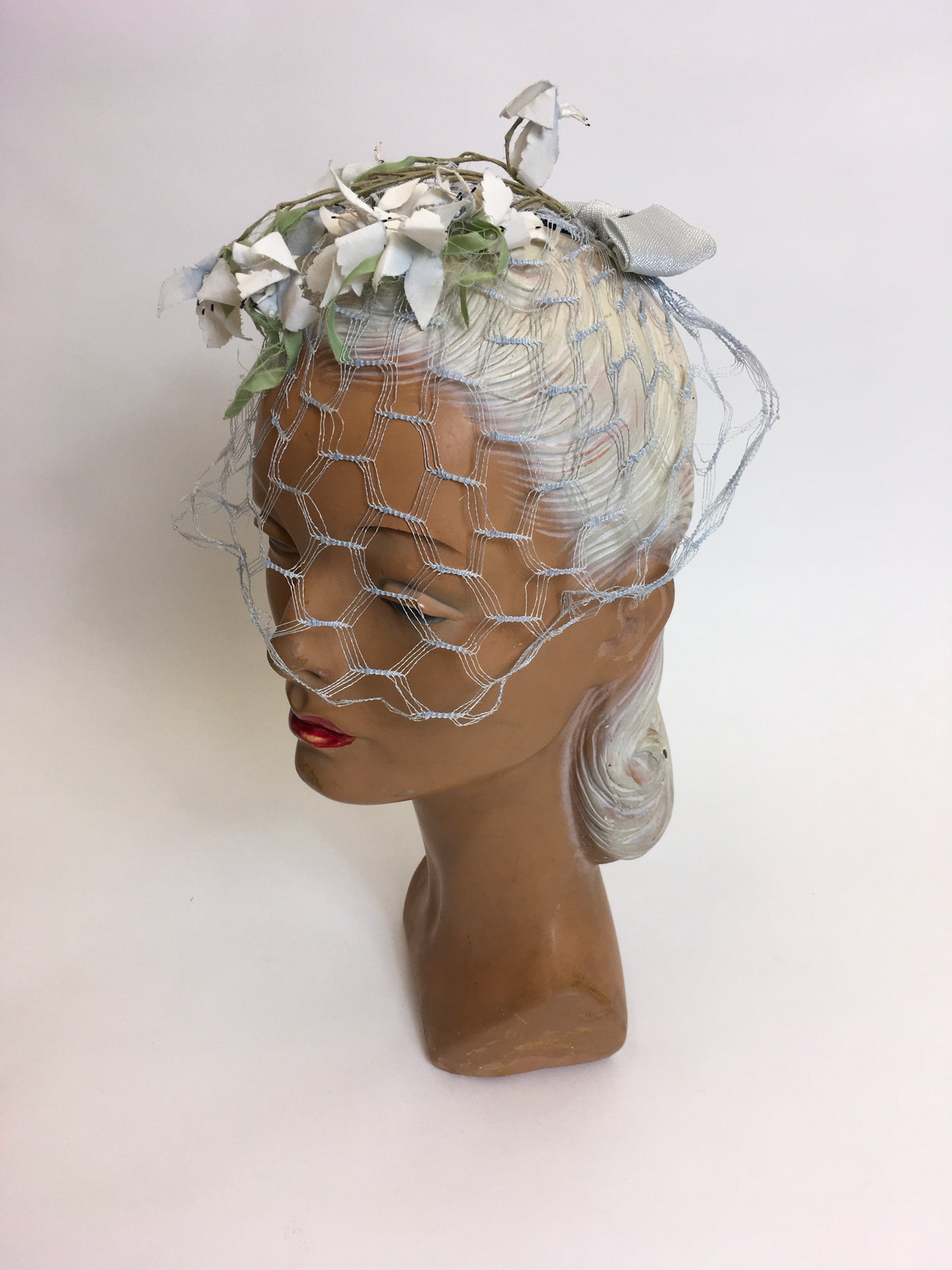 Original late 1940’s early 1950s Headpiece - Powder blue veiling adorned with ivory & green flowers
