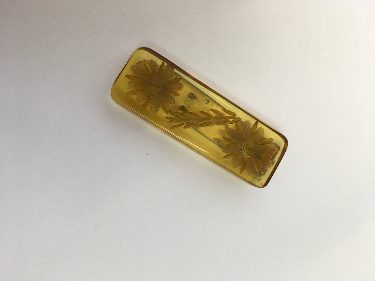 Original 1940s Carved Bakelite Dress Clip - In A Light Amber Colour way With Etched Florals